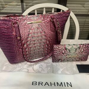 Purple multicolored Brahmin handbag and matching wallet.